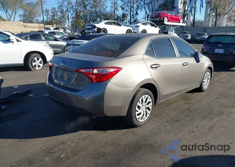 2019 Toyota Corolla Le z USA, uszkodzony, nr VIN 5YFBURHE0KP861771